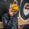 Gorro con pompón de Hufflepuff