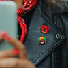 Set de 2 pins de Nita y Leon
